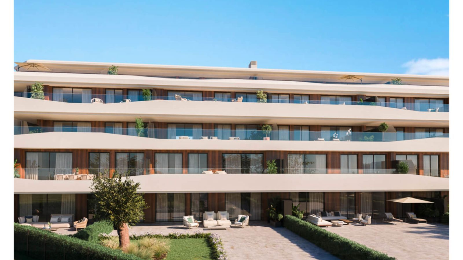 Lyxiga Core Higueron-lägenheter med balkonger och trädgård.